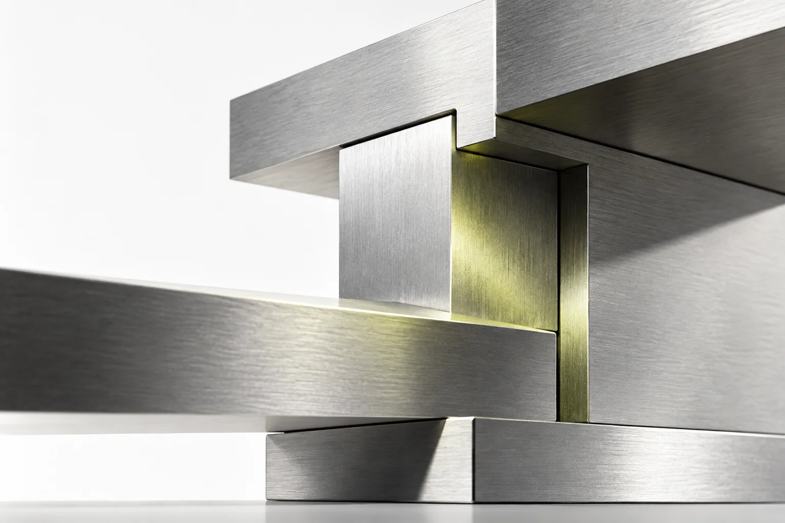 Interlocking precision-cut aluminum structures, reflecting a soft lime accent
